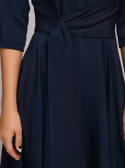 Kelli | Elegante Midi Jurk met Strikdetail en 3/4 Mouwen